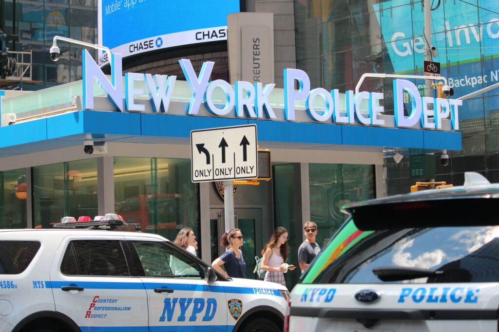 NYPD vehicles outside a New York Police Department building.